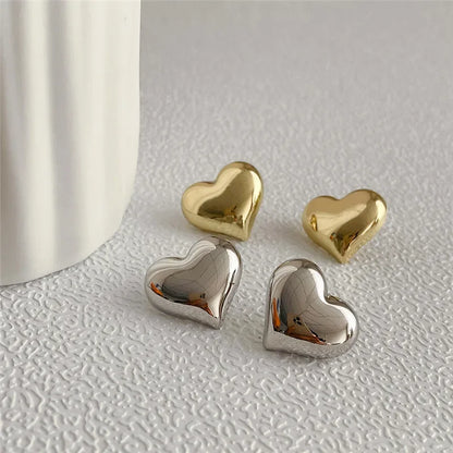 LATS Big & Small Heart Shaped Smooth Surface Stud Earrings In Gold and Silver